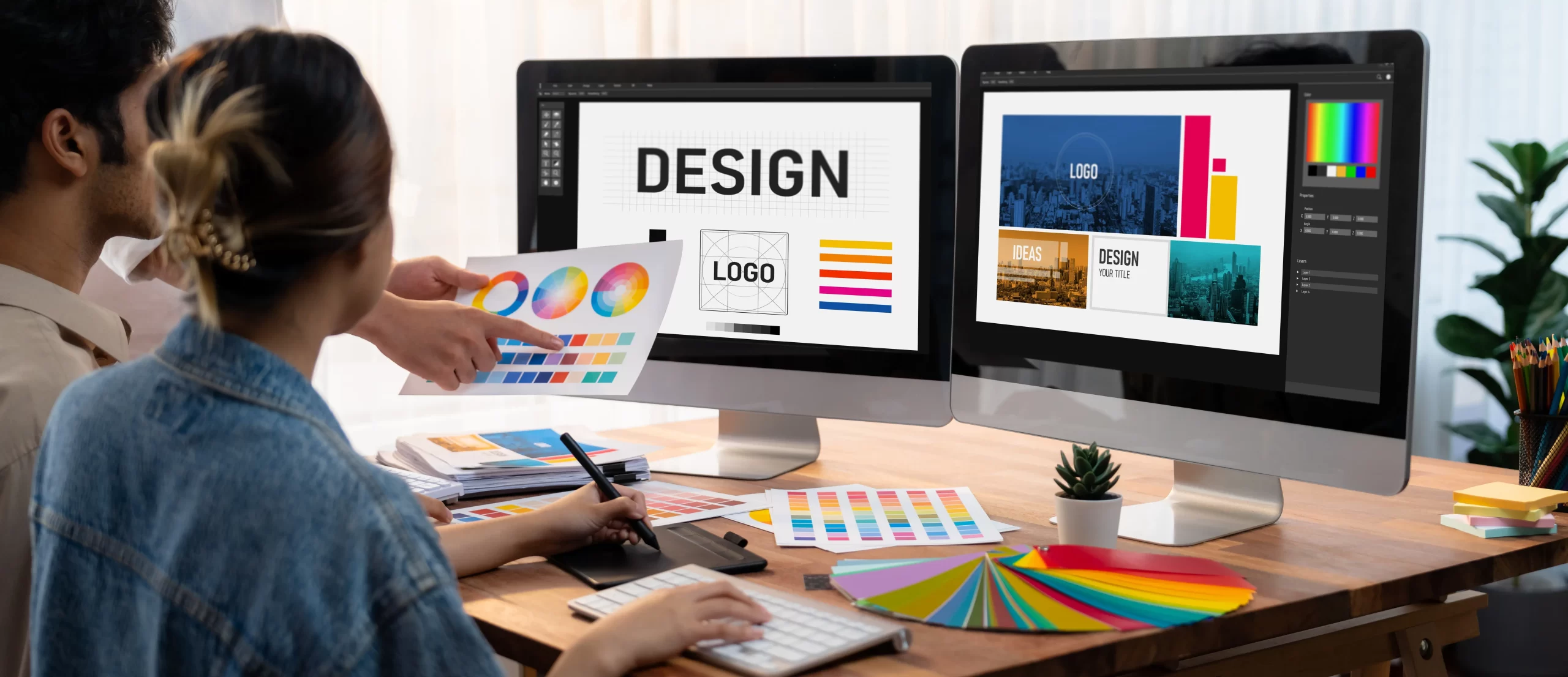 Custom web design and branding workspace with logo and color palette mockups